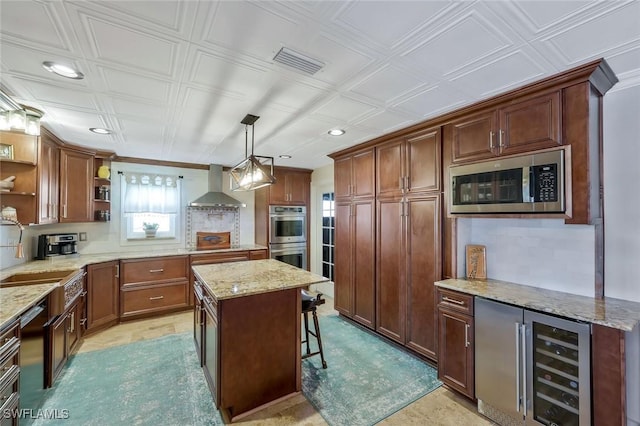 2135 SE 15th St, Cape Coral, FL 33990 - kitchen featuring stainless steel appliances, wall chimney exhaust hood, wine cooler, open shelves, and recessed lighting