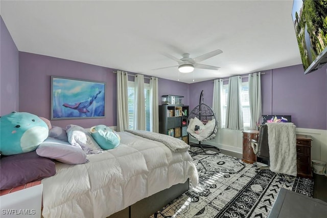 2135 SE 15th St, Cape Coral, FL 33990 - bedroom featuring multiple windows and a ceiling fan