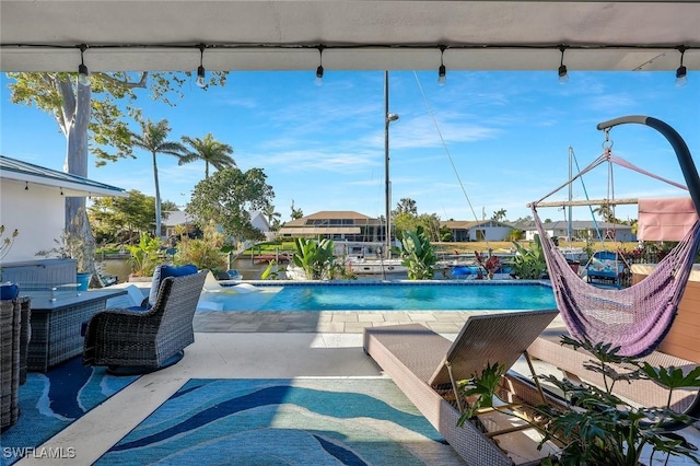 2135 SE 15th St, Cape Coral, FL 33990 - swimming pool featuring a patio