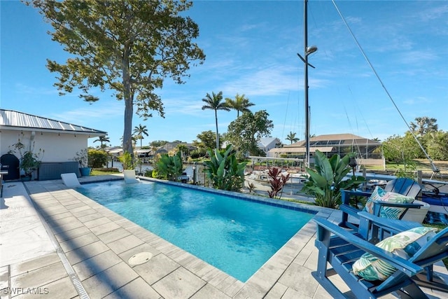 2135 SE 15th St, Cape Coral, FL 33990 - outdoor pool featuring a patio area