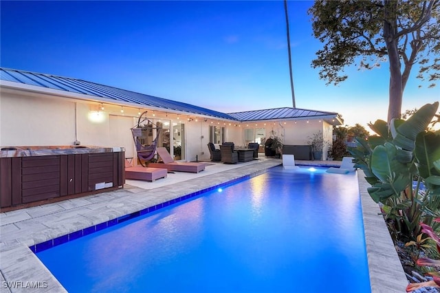 2135 SE 15th St, Cape Coral, FL 33990 - view of pool featuring a hot tub and a patio