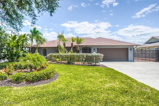 27375 Imperial Oaks Cir, Bonita Springs, FL 34135 - single story home with stucco siding, driveway, an attached garage, a front lawn, and fence