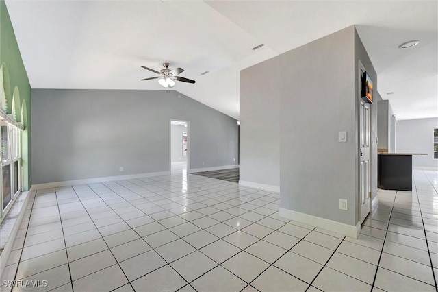 27375 Imperial Oaks Cir, Bonita Springs, FL 34135 - interior space featuring baseboards, a ceiling fan, light tile patterned flooring, visible vents, and lofted ceiling