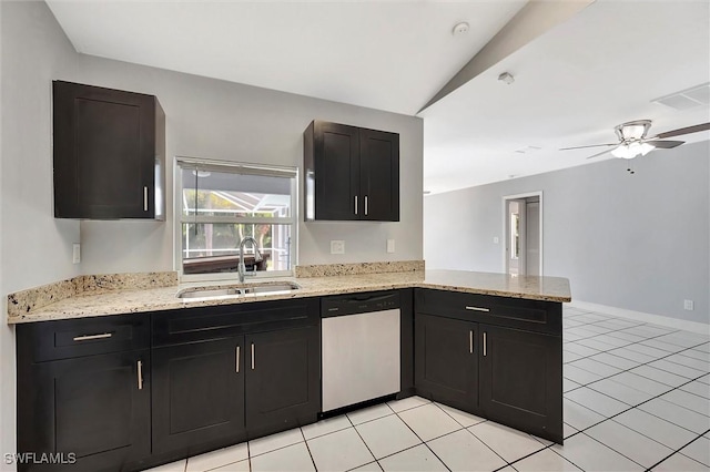 27375 Imperial Oaks Cir, Bonita Springs, FL 34135 - kitchen with a sink, stainless steel dishwasher, dark cabinetry, and a peninsula