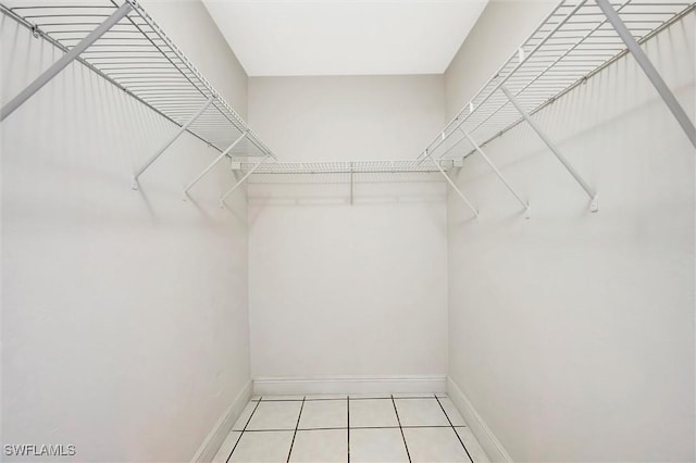 27375 Imperial Oaks Cir, Bonita Springs, FL 34135 - spacious closet with light tile patterned floors
