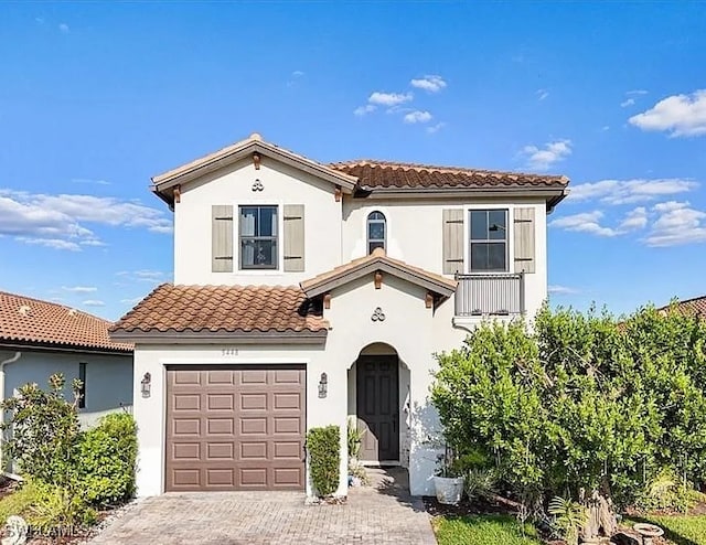 5448 Agostino Way, Ave Maria, FL 34142 - mediterranean / spanish-style home with a tiled roof, stucco siding, and decorative driveway