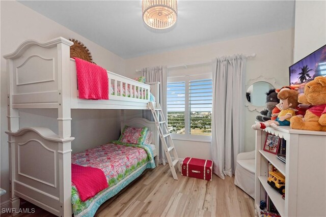 bedroom with light wood-style flooring