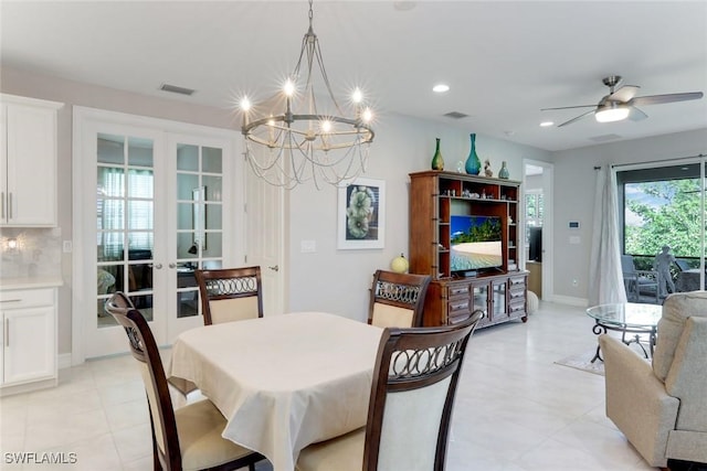 dining room with french doors, visible vents, recessed lighting, and ceiling fan with notable chandelier