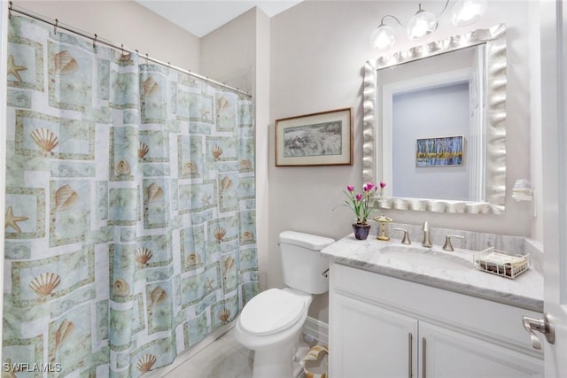 full bath featuring a shower with shower curtain, tile patterned flooring, vanity, and toilet