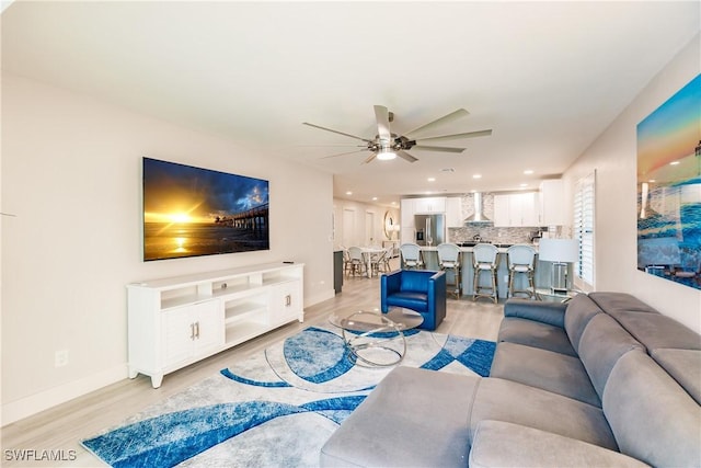 668 104th Ave N, Naples, FL 34108 - living area featuring recessed lighting, ceiling fan, baseboards, and light wood-style floors