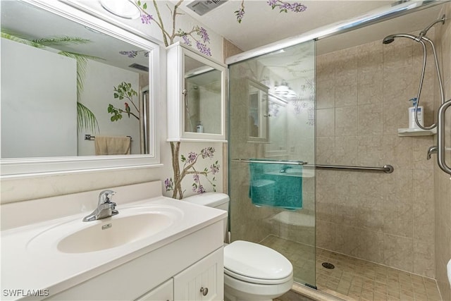 1624 Pine Valley Dr Unit 212, Fort Myers, FL 33907 - full bathroom with visible vents, toilet, a shower stall, and vanity