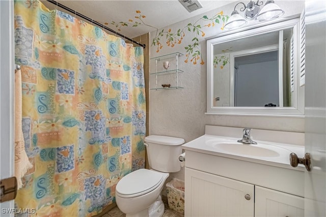 1624 Pine Valley Dr Unit 212, Fort Myers, FL 33907 - full bathroom featuring vanity, curtained shower, a textured wall, toilet, and visible vents