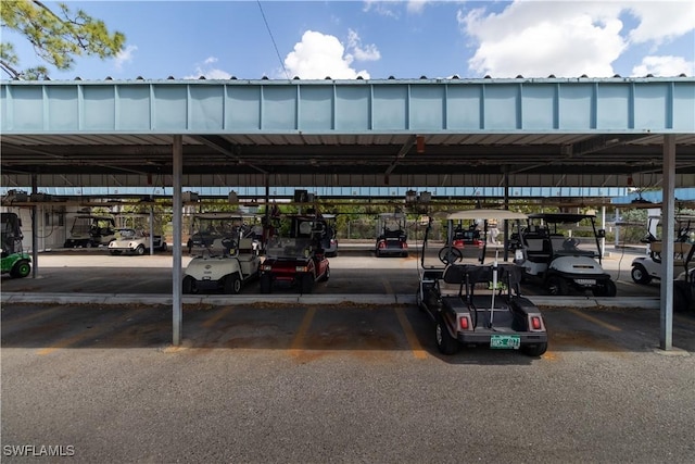 1624 Pine Valley Dr Unit 212, Fort Myers, FL 33907 - view of covered parking lot