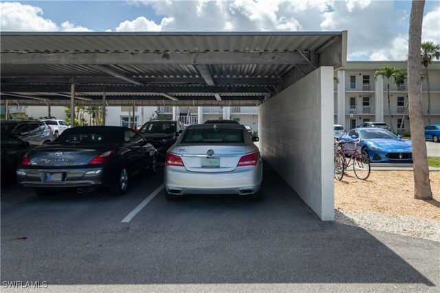1624 Pine Valley Dr Unit 212, Fort Myers, FL 33907 - view of covered parking lot