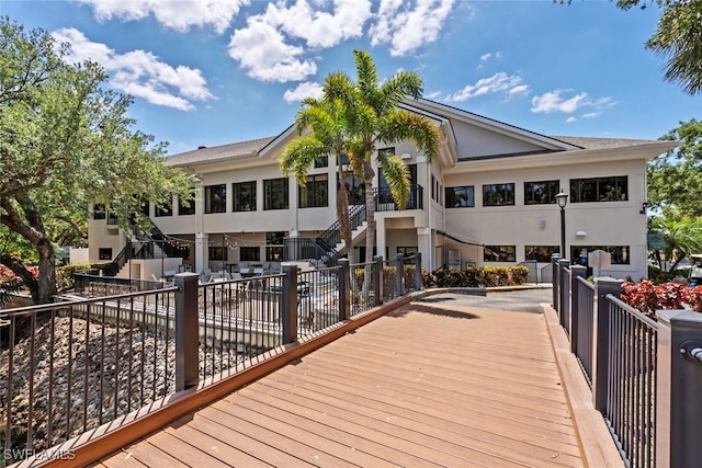 20657 Country Barn Dr, Estero, FL 33928 - wooden terrace featuring stairway