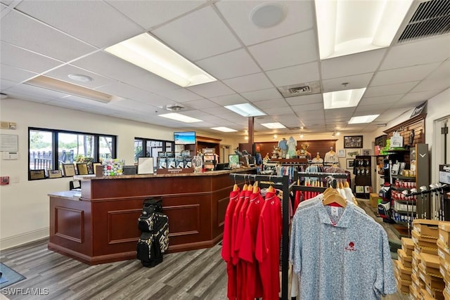 20657 Country Barn Dr, Estero, FL 33928 - misc room with visible vents, a paneled ceiling, and wood finished floors
