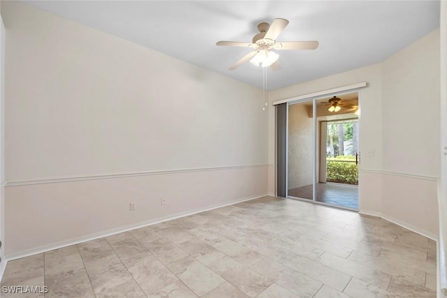 20657 Country Barn Dr, Estero, FL 33928 - empty room with baseboards and a ceiling fan