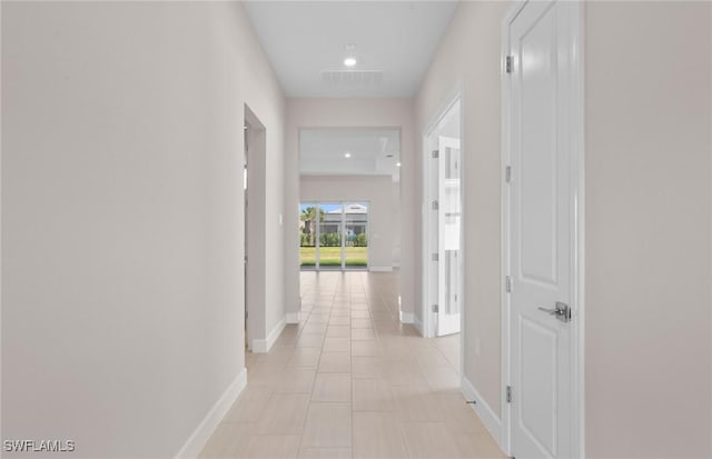 7060 Del Webb Oak Creek Blvd, North Fort Myers, FL 33917 - corridor featuring baseboards, recessed lighting, and light tile patterned floors