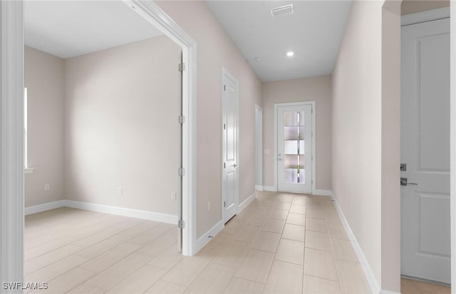 7060 Del Webb Oak Creek Blvd, North Fort Myers, FL 33917 - corridor with baseboards and recessed lighting