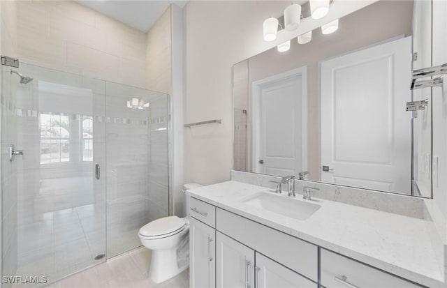 7060 Del Webb Oak Creek Blvd, North Fort Myers, FL 33917 - full bathroom with a shower stall, toilet, vanity, and tile patterned flooring