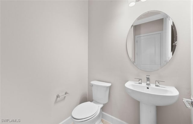 7060 Del Webb Oak Creek Blvd, North Fort Myers, FL 33917 - half bath featuring toilet and baseboards