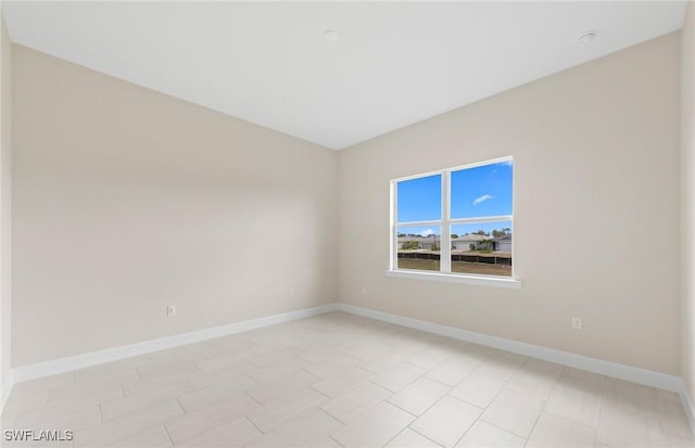 7060 Del Webb Oak Creek Blvd, North Fort Myers, FL 33917 - unfurnished room with baseboards