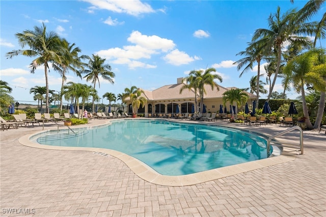 pool with a patio area