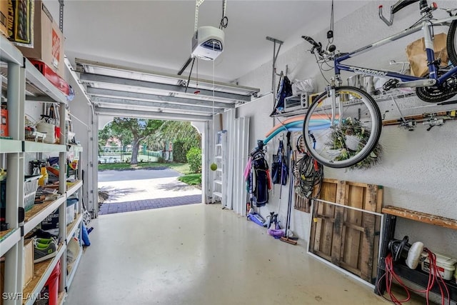 garage featuring a garage door opener