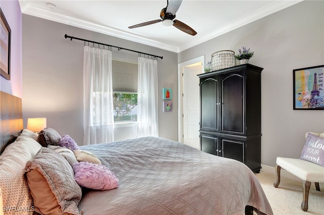 bedroom featuring light colored carpet, crown molding, and ceiling fan