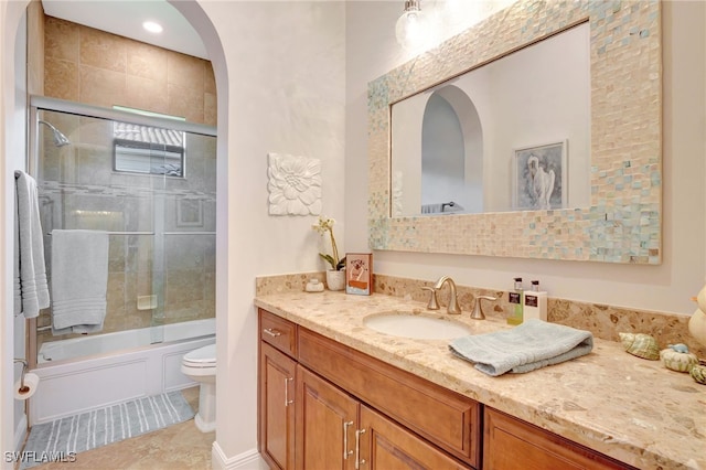 14501 Marsala Way, Naples, FL 34109 - bathroom featuring vanity and enclosed tub / shower combo