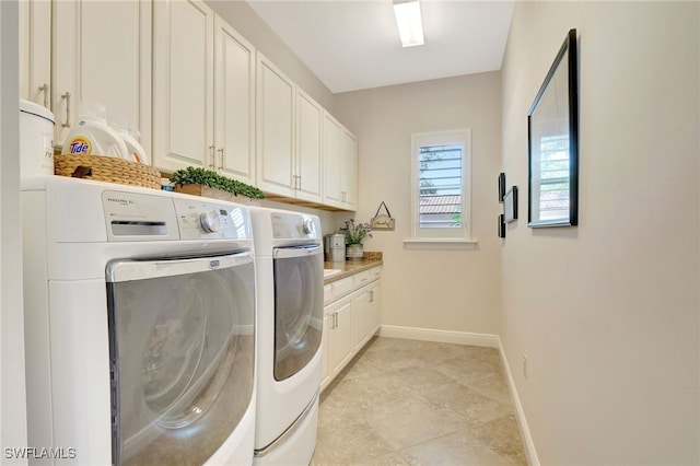 14501 Marsala Way, Naples, FL 34109 - laundry area with washing machine and dryer and cabinet space