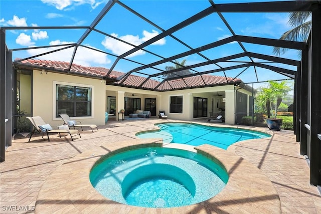 14501 Marsala Way, Naples, FL 34109 - view of pool with ceiling fan, a pool with connected hot tub, a patio area, and an outdoor living space