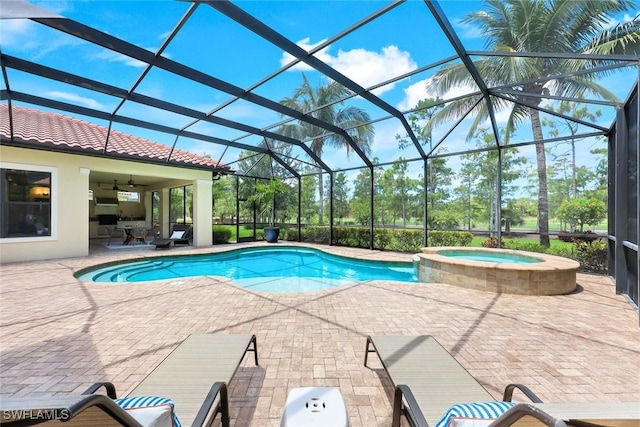 14501 Marsala Way, Naples, FL 34109 - view of swimming pool with a ceiling fan, a patio, a pool with connected hot tub, and glass enclosure