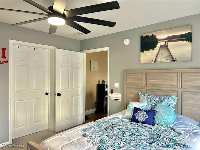 bedroom featuring visible vents and a ceiling fan