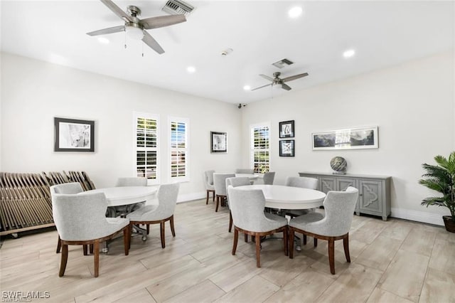 7099 Pond Cypress Ct Unit 102, Naples, FL 34109 - dining space with a ceiling fan, recessed lighting, light wood-style flooring, and baseboards