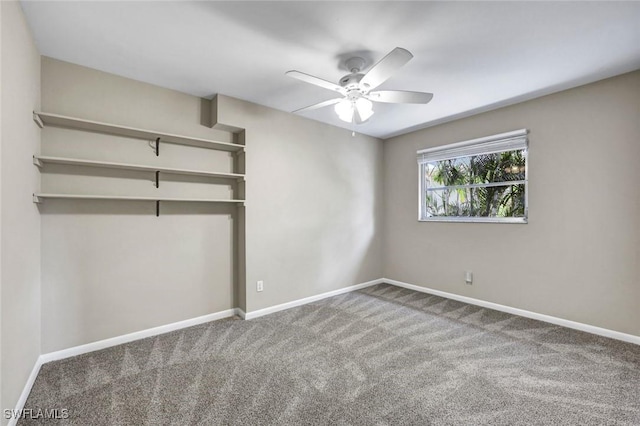 547 103rd Ave N, Naples, FL 34108 - unfurnished bedroom with carpet, baseboards, and ceiling fan