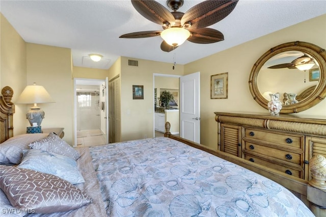 1150 Wildwood Lakes Blvd Unit 306, Naples, FL 34104 - bedroom featuring a ceiling fan, visible vents, a closet, and ensuite bathroom