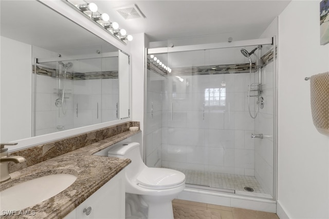 1150 Wildwood Lakes Blvd Unit 306, Naples, FL 34104 - full bath with vanity, visible vents, toilet, and a stall shower