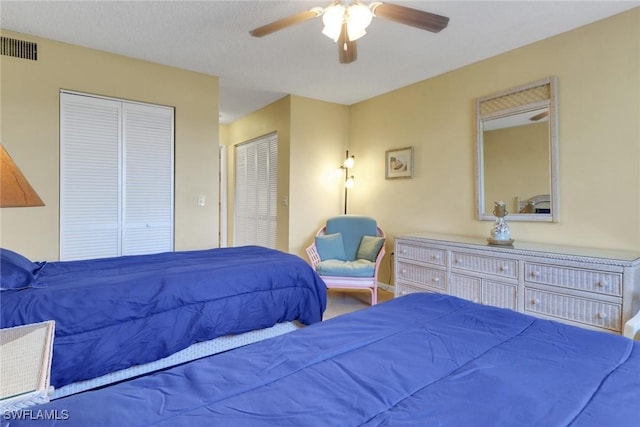 1150 Wildwood Lakes Blvd Unit 306, Naples, FL 34104 - bedroom featuring visible vents and ceiling fan