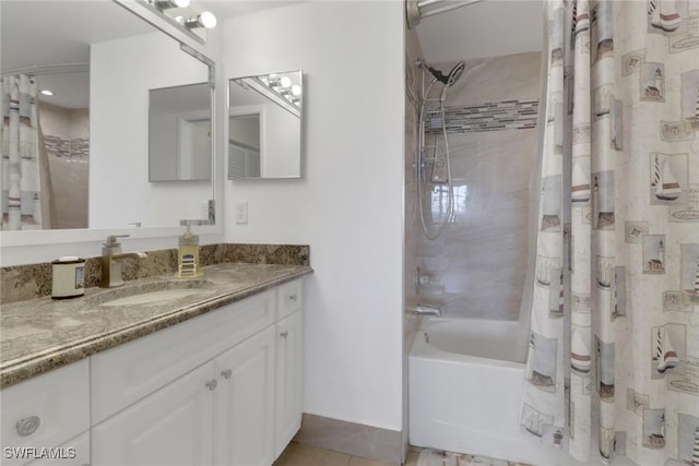 1150 Wildwood Lakes Blvd Unit 306, Naples, FL 34104 - bathroom featuring shower / bath combo with shower curtain, tile patterned flooring, and vanity