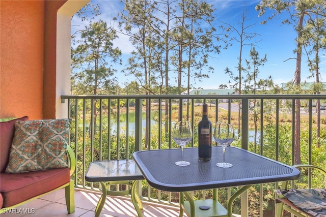 1150 Wildwood Lakes Blvd Unit 306, Naples, FL 34104 - balcony featuring a water view