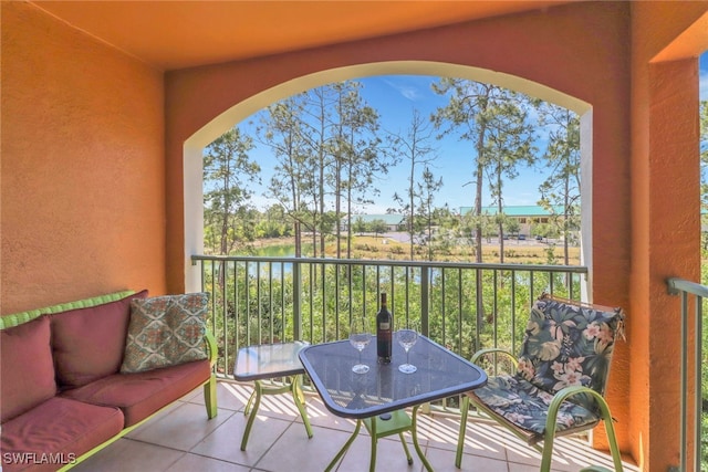 1150 Wildwood Lakes Blvd Unit 306, Naples, FL 34104 - balcony featuring a water view