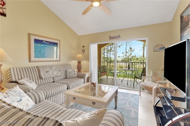 1150 Wildwood Lakes Blvd Unit 306, Naples, FL 34104 - living area featuring a ceiling fan, tile patterned flooring, and lofted ceiling