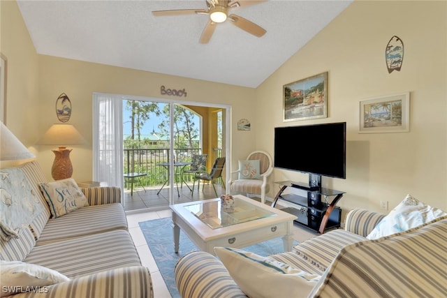 1150 Wildwood Lakes Blvd Unit 306, Naples, FL 34104 - tiled living room with high vaulted ceiling, a ceiling fan, and a textured ceiling