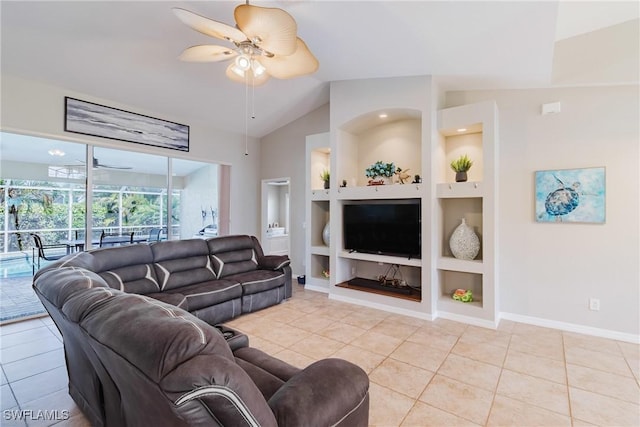 living room with tile patterned flooring, built in features, ceiling fan, lofted ceiling, and a sunroom