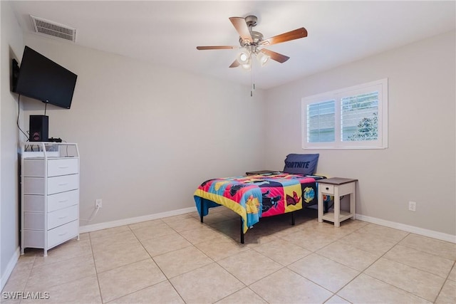 bedroom featuring baseboards, visible vents, and light tile patterned floors