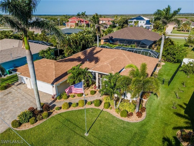 birds eye view of property with a residential view