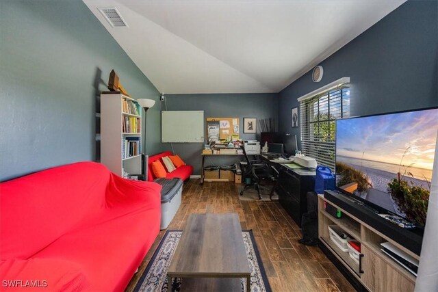 3322 SW 29th Ave, Cape Coral, FL 33914 - living room featuring wood finished floors, vaulted ceiling, and visible vents