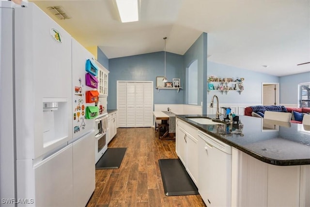 3322 SW 29th Ave, Cape Coral, FL 33914 - kitchen with visible vents, white cabinets, a sink, white appliances, and lofted ceiling