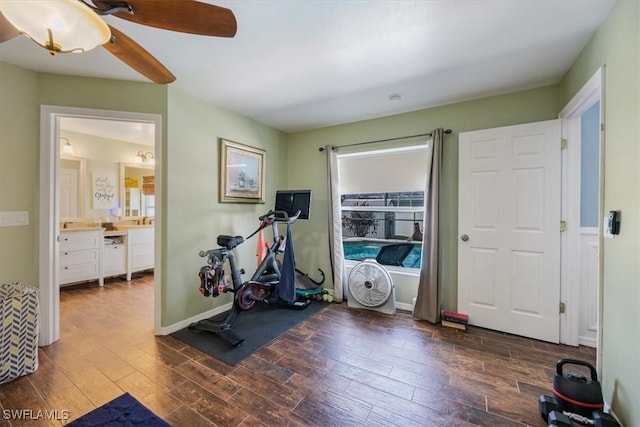 3322 SW 29th Ave, Cape Coral, FL 33914 - exercise room with wood finished floors, ceiling fan, and baseboards